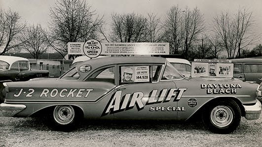 Black and white photo of old Nascar with Air Lift suspension