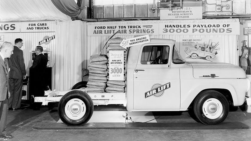 Black and white photo of old truck with air lift suspension!
