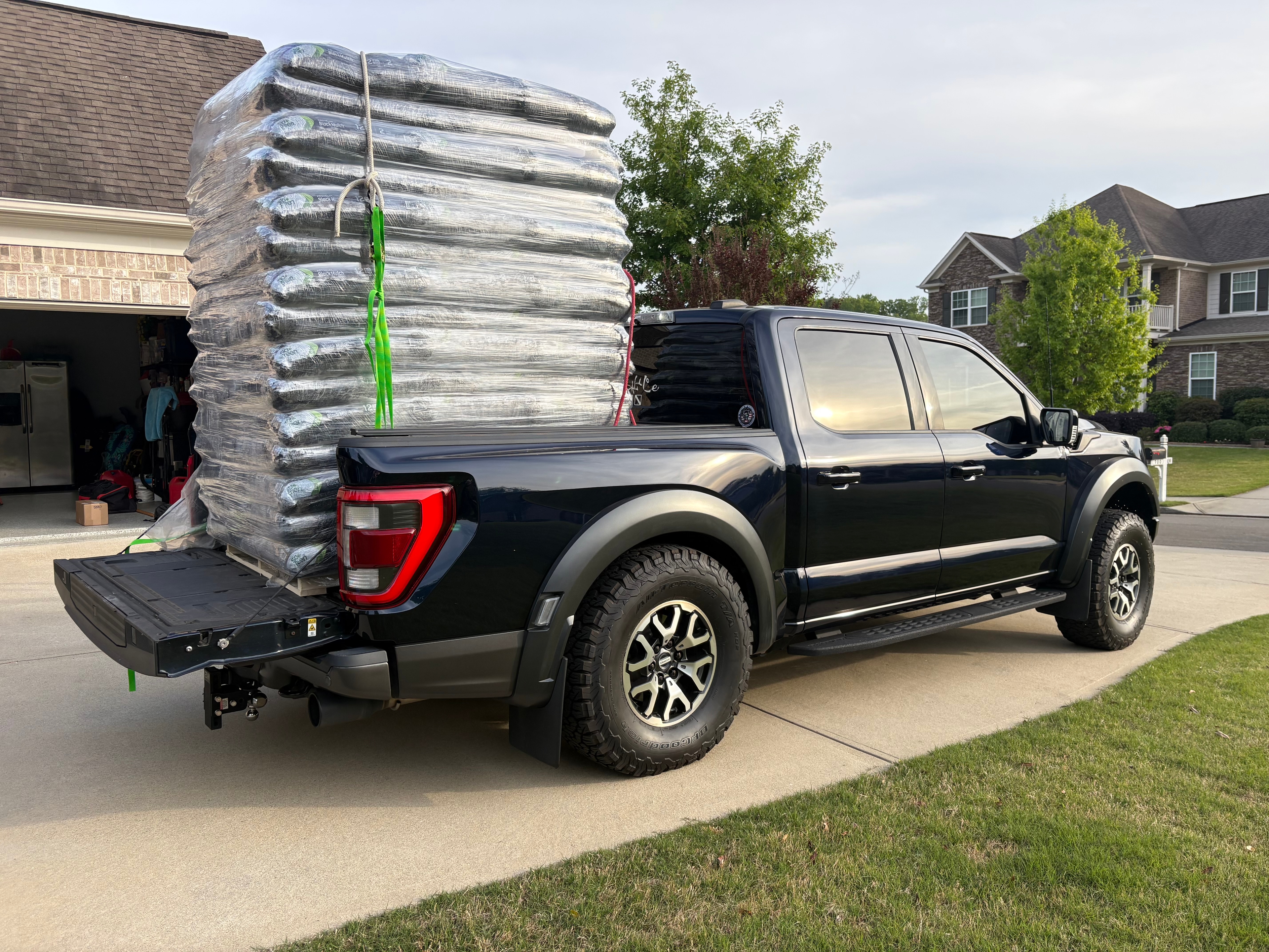 Before: 75 wet bags of mulch with factory suspension support